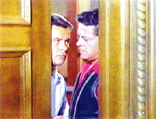 image of Jim and Artie staring at each other in a doorway]